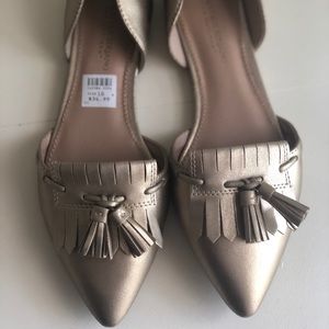 Christian Siriano gold tassel flats